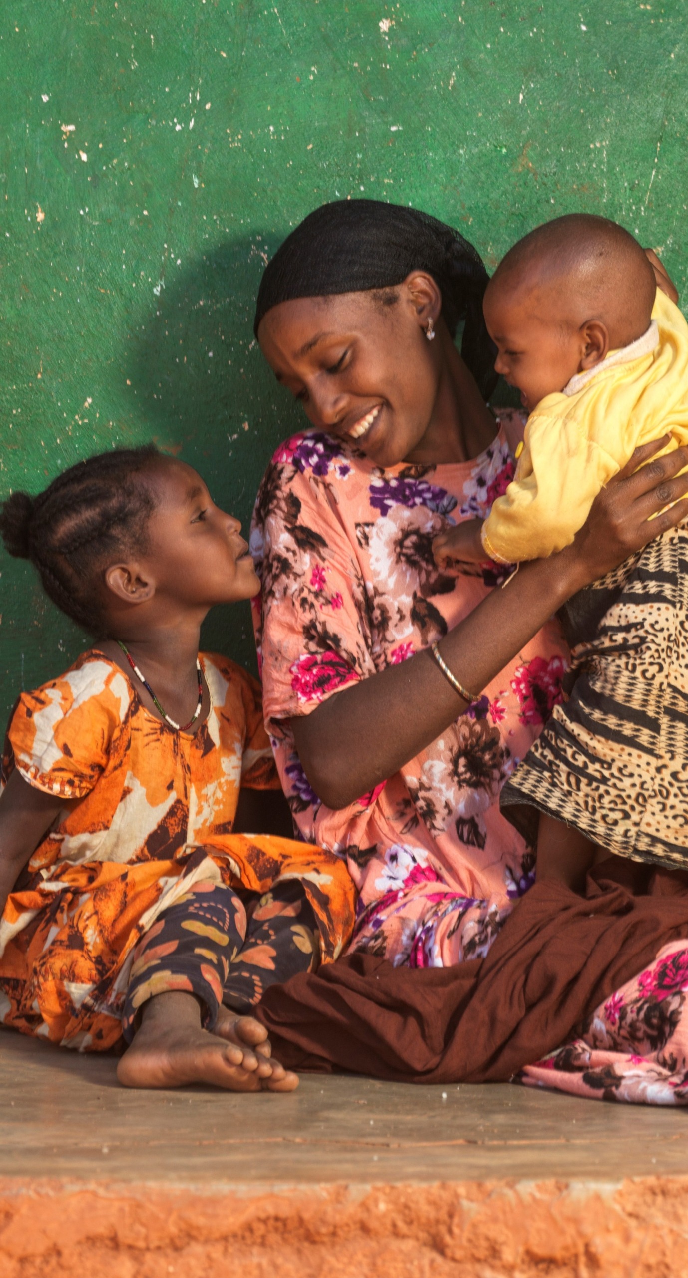 Darmi, 23, with daughters Lelo, 4, and Nadi, 1, at home in Moyale  .
