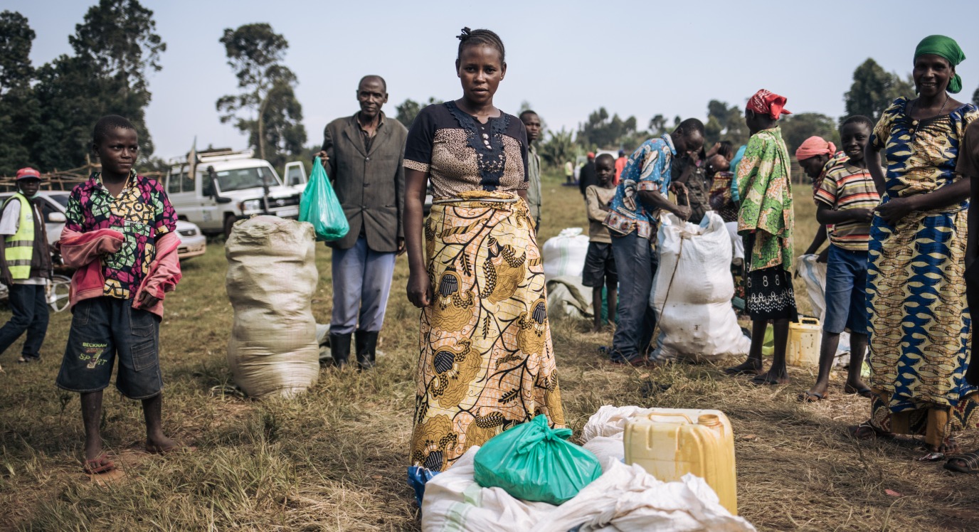 Cécile Tabo Mapamadjo, 28, shops for her family with support from Action Against Hunger at the Largu Food Market, in Ituri, eastern Democratic Republic of Congo.
