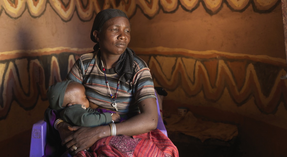 Loko Diba Boru, 35, with her baby boy Gelgalo, 10 months old, in Hidhi Miribi, Ethiopia.