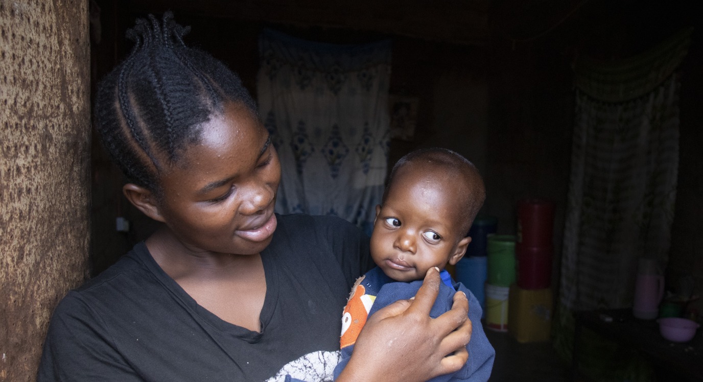 Mariam and her son Goodluck at home.