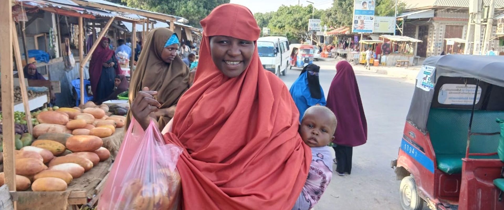 Maryan buys food with emergency cash.