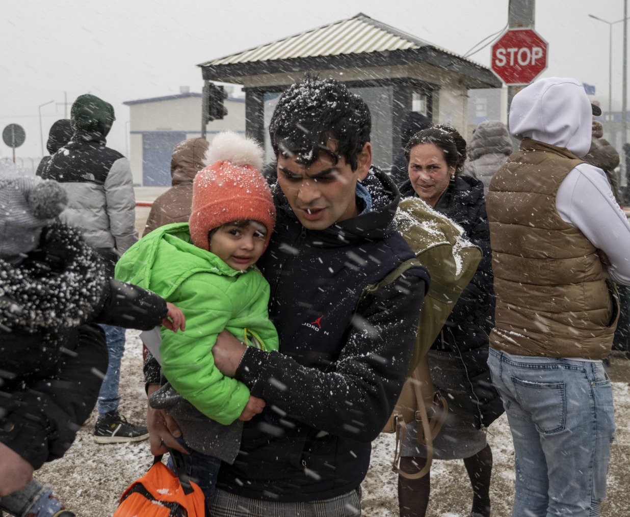 Ukrainian refugees face winter weather as they cross the border into Moldova.