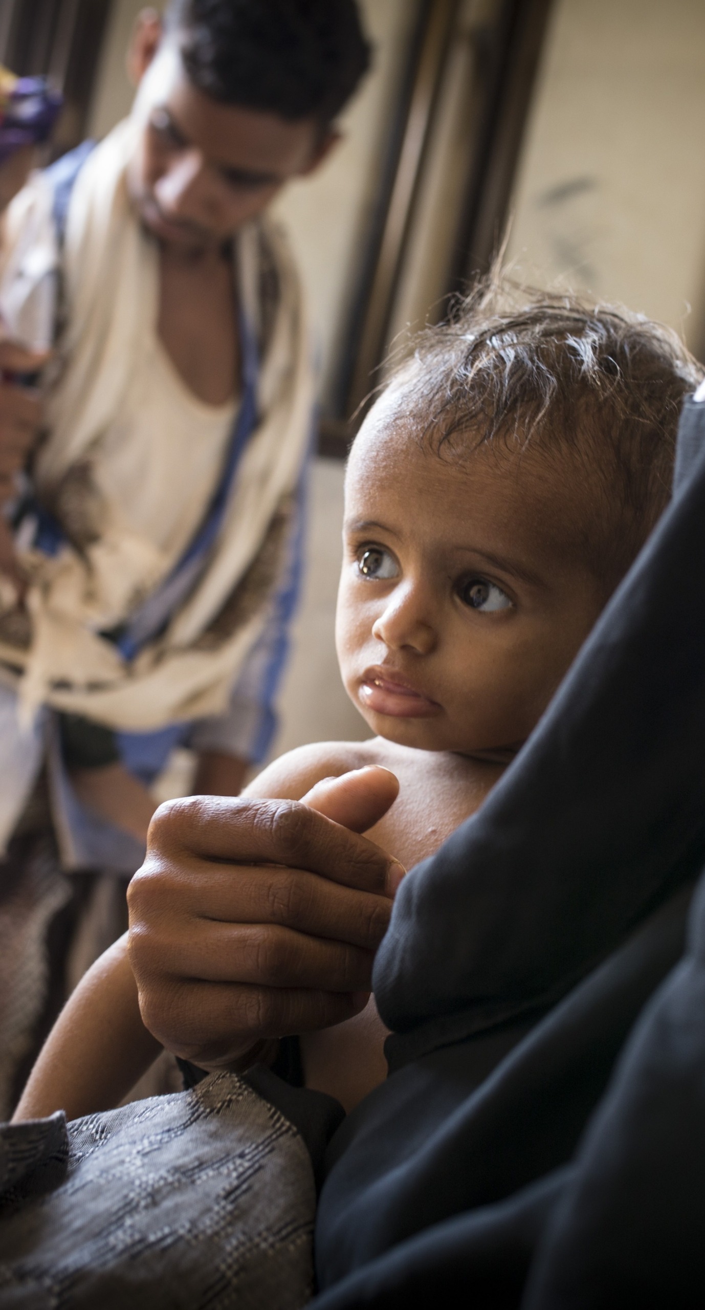 A child is treated at one of Action Against Hunger's health clinics in Yemen.