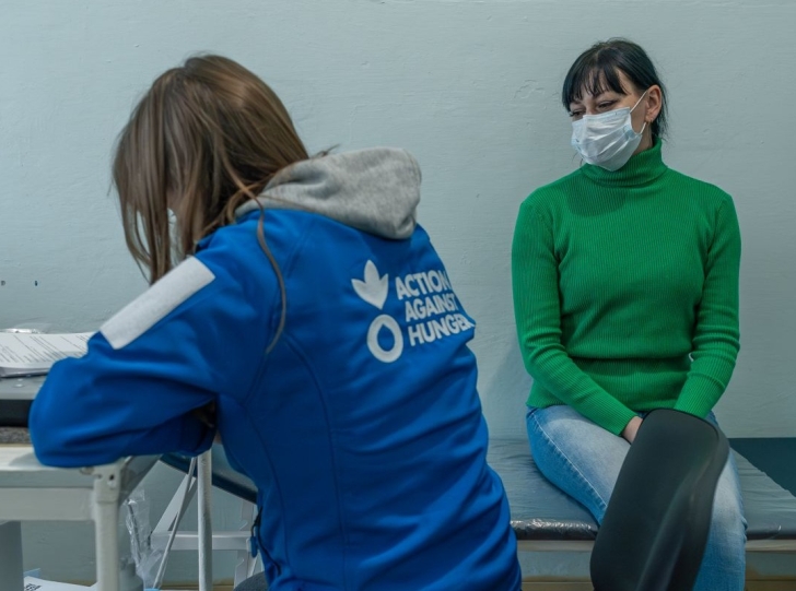 Oksana, 42, local resident of Andriivka on the breast checkup of ACF mobile unit in the local clinic in Andriivka village, Kharkiv region, Ukraine on 8 December 2025