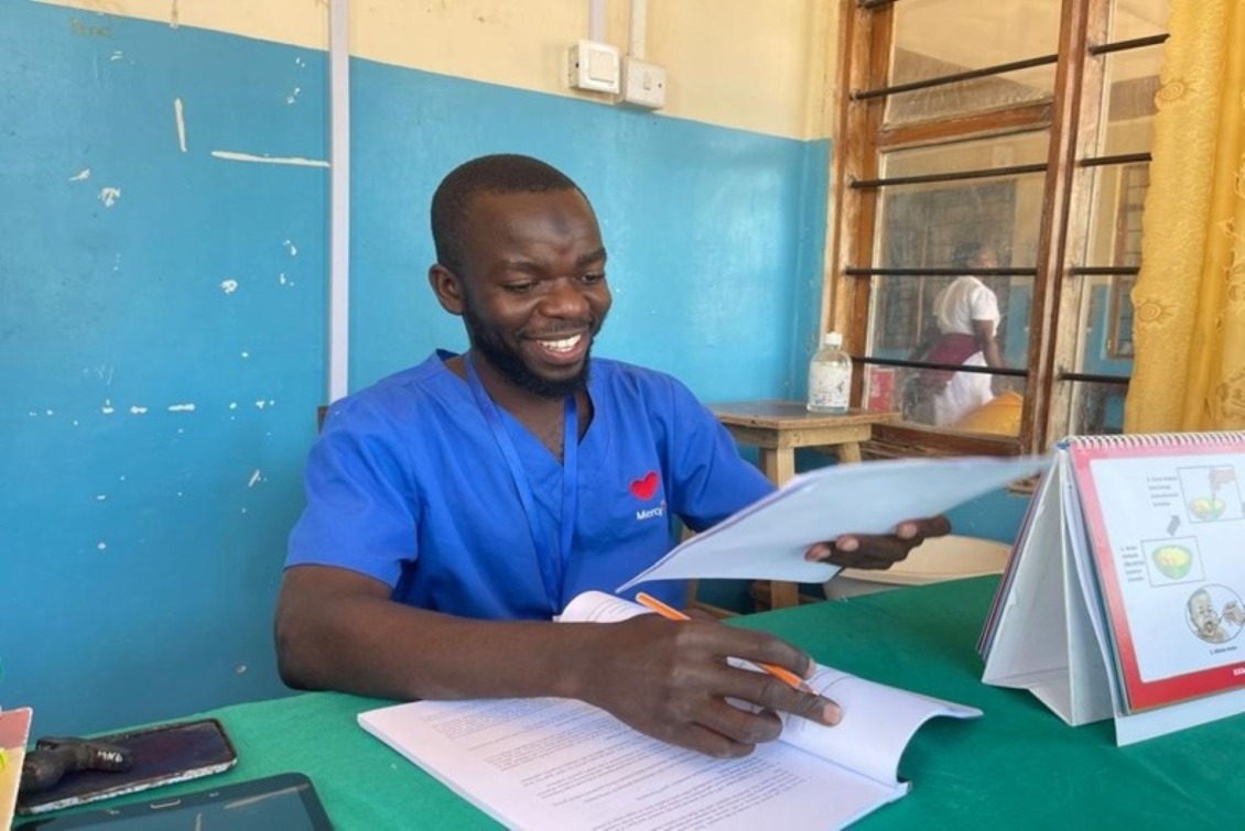 Isack Mabula, an Enrolled Nurse (EN) at Mindola dispensary